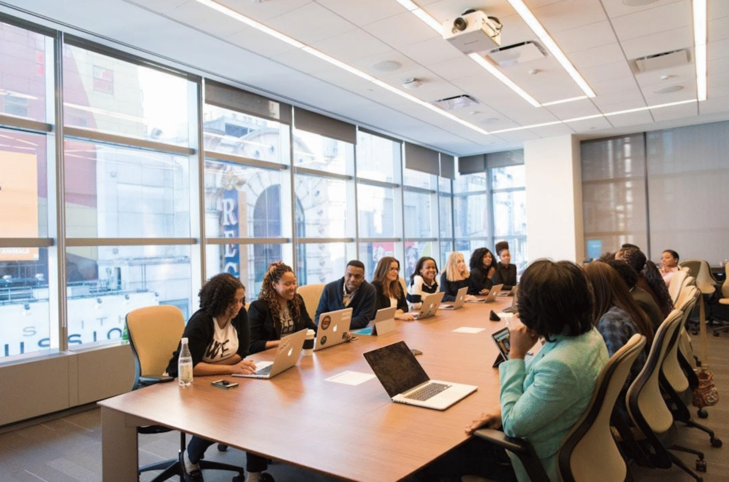 A group of professionals implementing the best opportunity management systems to automate mundane tasks and streamline workflows